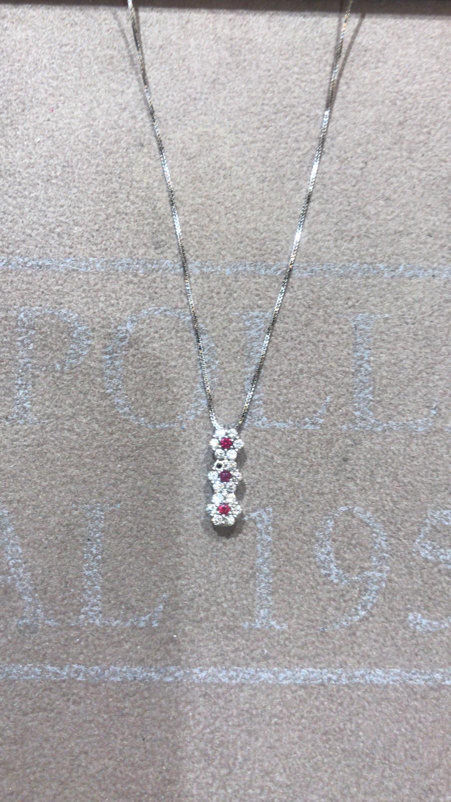 Pendente rubini oro bianco 750%