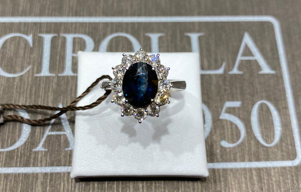 Anello zaffiro blu oro bianco