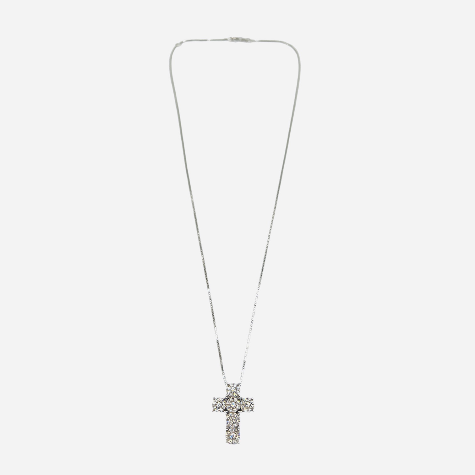 White gold cross pendant and SILK diamonds Art. CR113