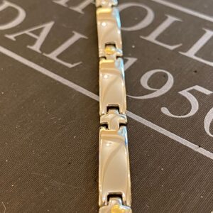 bracciale uomo semi rigido acciaio chiodini  in oro 750%