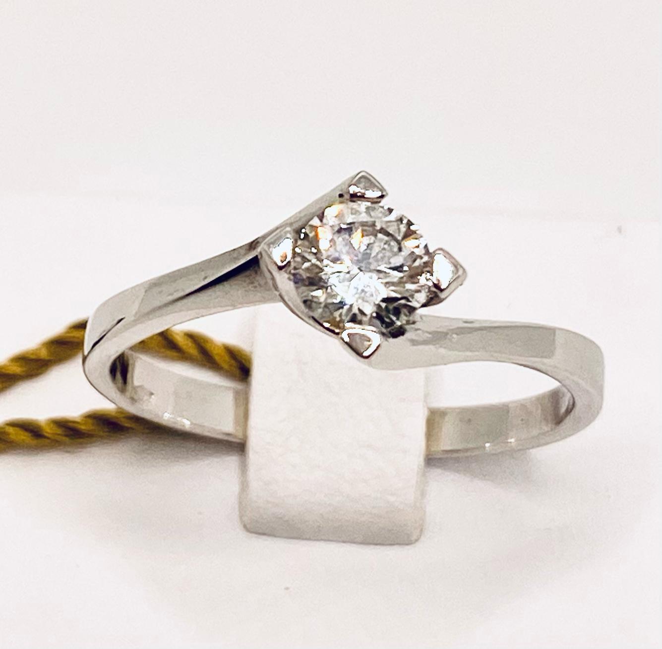 Solitary ring of diamonds and gold LOOKS art. AN2619