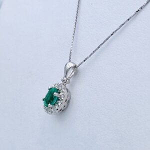 Pendente con diamanti  smeraldo oro bianco 750 % Art.CD720