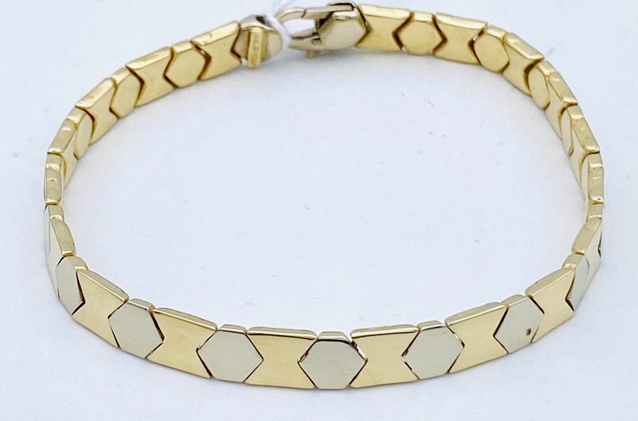 Bracciale uomo oro giallo,bianco 750% GR. 17,20 ART. BRUC02