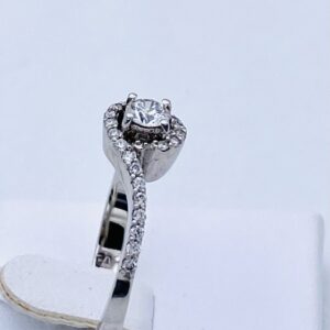 Anello solitario di diamanti  VORTICI  oro bianco 750% Art.AN1376