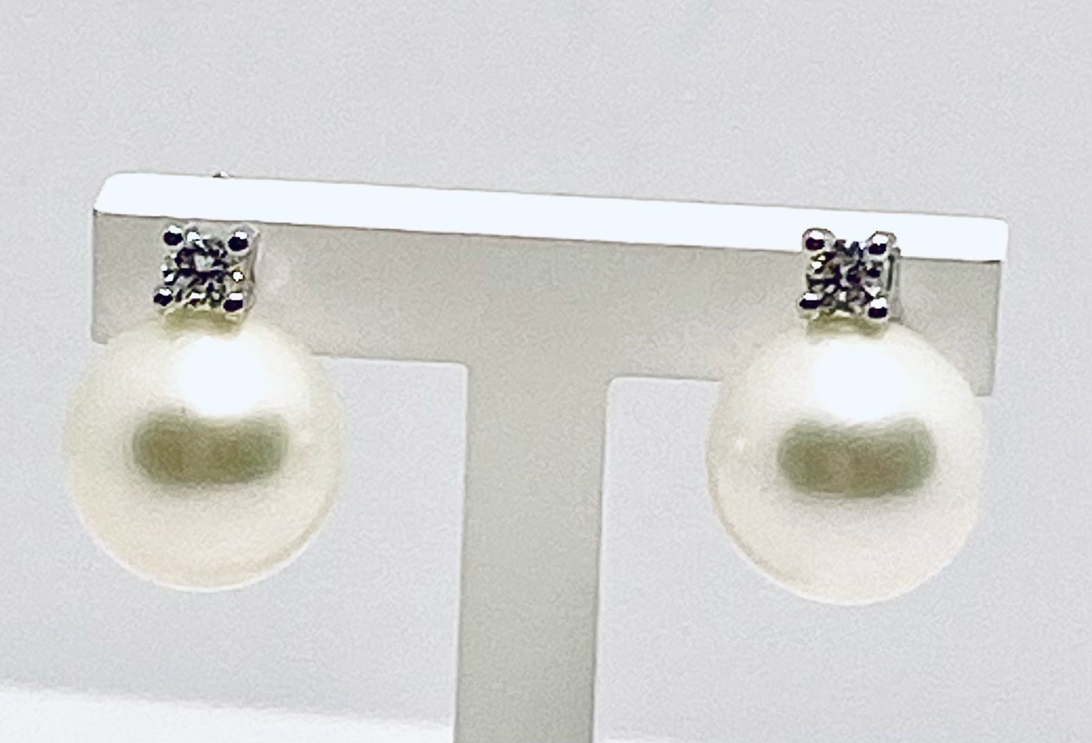 Earrings of pearls and diamonds art.ORP243-1