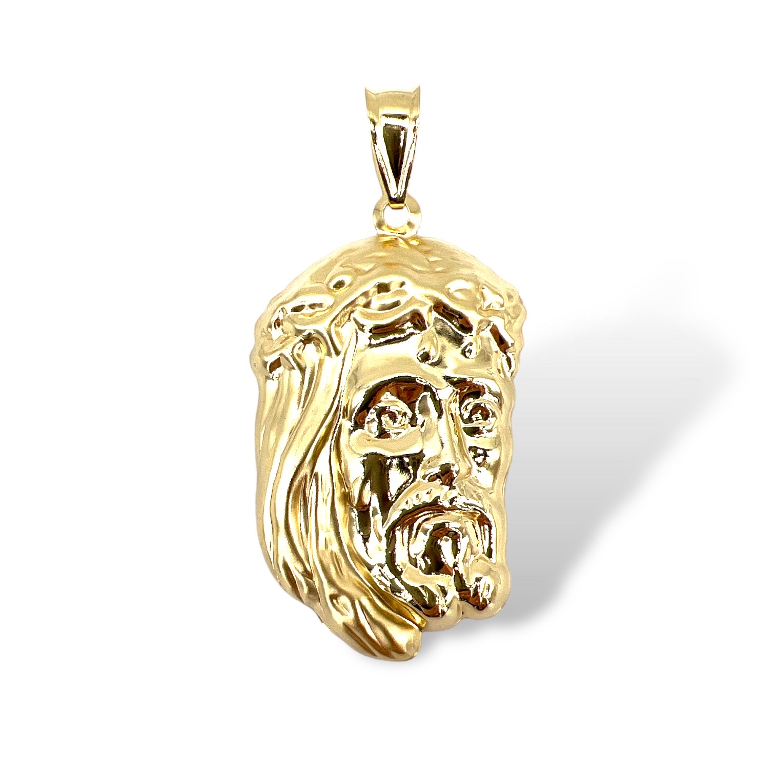 Christ face pendant in gold Art. TCOR2