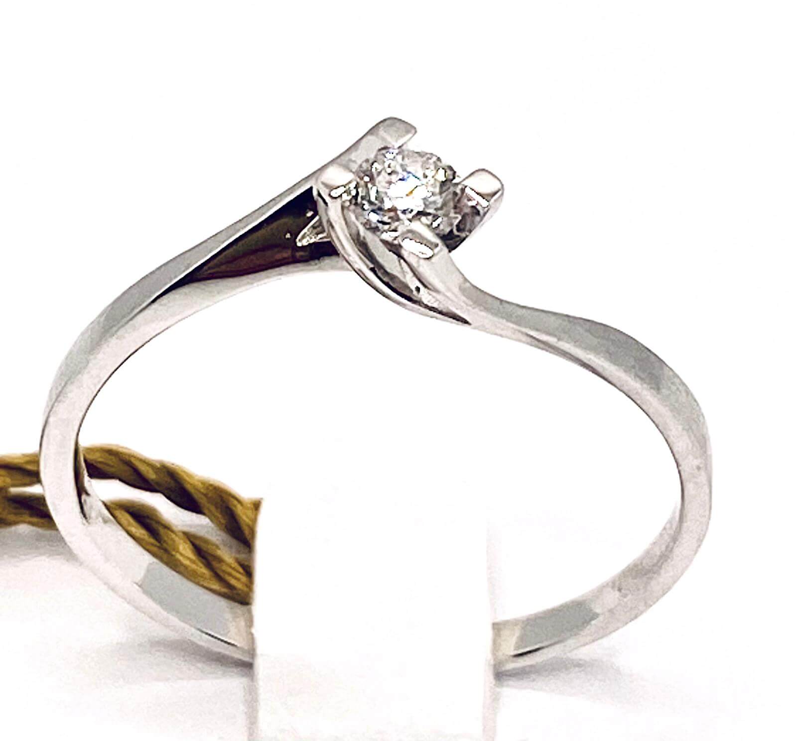 Anello solitario di diamanti a contraire art.AN1412