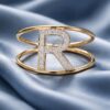 Anello iniziale R oro e diamanti art. AN-R G