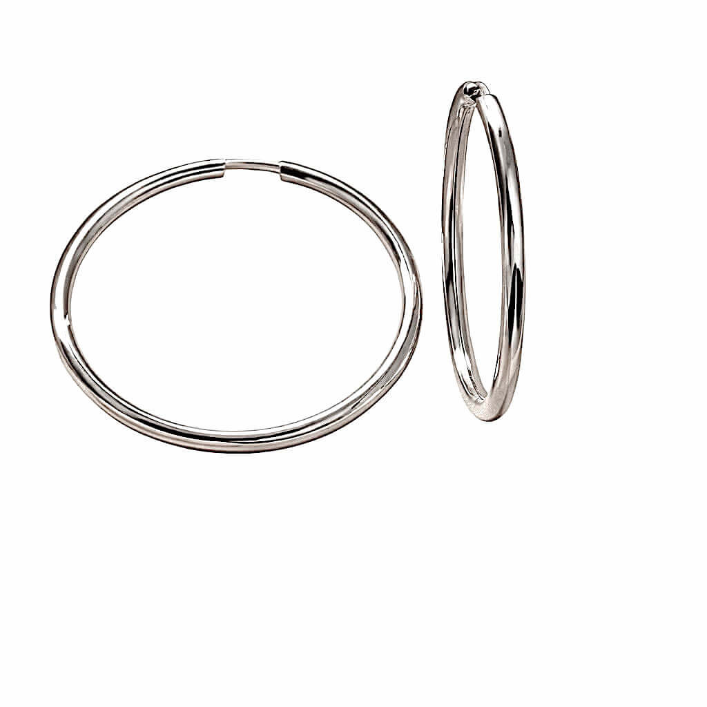 Orecchini a cerchio  in oro bianco 18 kt Art. OR20
